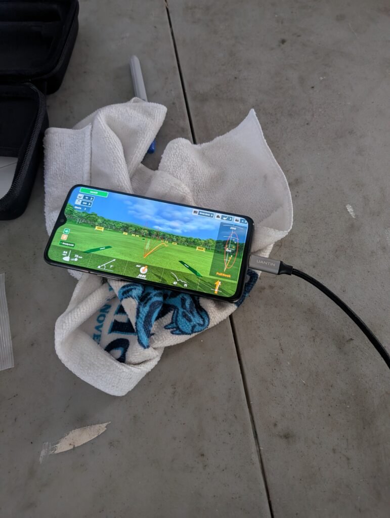 Simulator PC and display setup running golf simulation software